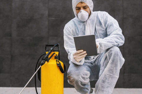 Man in virus protective suit