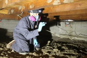 Residential crawl space inspection conducted by a MightyMite Termite pest control professional 
